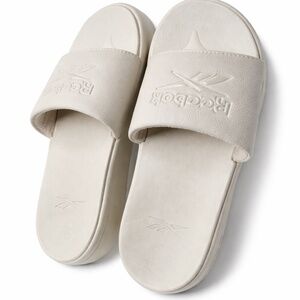 new beige Reebok flip-flops size 8